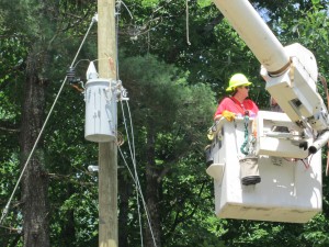 We are adding a trasnformer to the power pole.