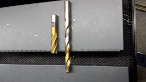 end mill on left helps square materials and cuts sides, drill bit goes into the material. 