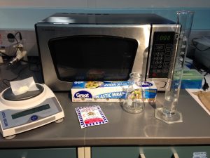 This is a picture of all the materials a teacher would need to make Agar. The Agar is pipetted into the bottom of the petri dish before the nutrient sources are placed in the corners and the bacteria is placed in the center. 