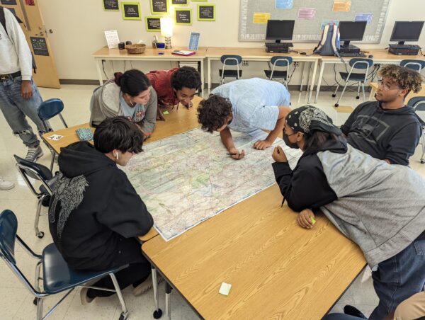 A group of Campbell's students work on a class project. 
