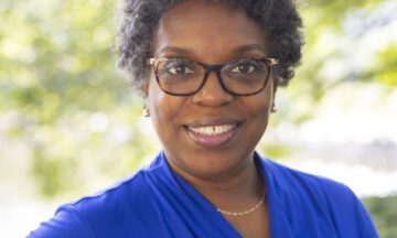 Headshot of Shavonne Speight wearing a blue blouse.