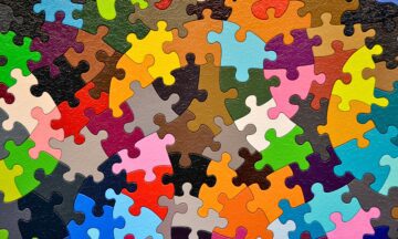 close up of colorful jigsaw puzzle pieces