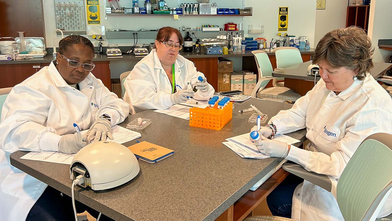STEMwork scholars do an activity in the community lab at Biogen as part of an educators in industry experience.