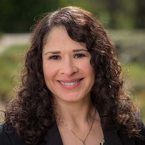 Outdoor headshot of Amneris Solano