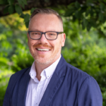 Outdoor portrait of Eric Eaton, a middle school teacher in Polk County.