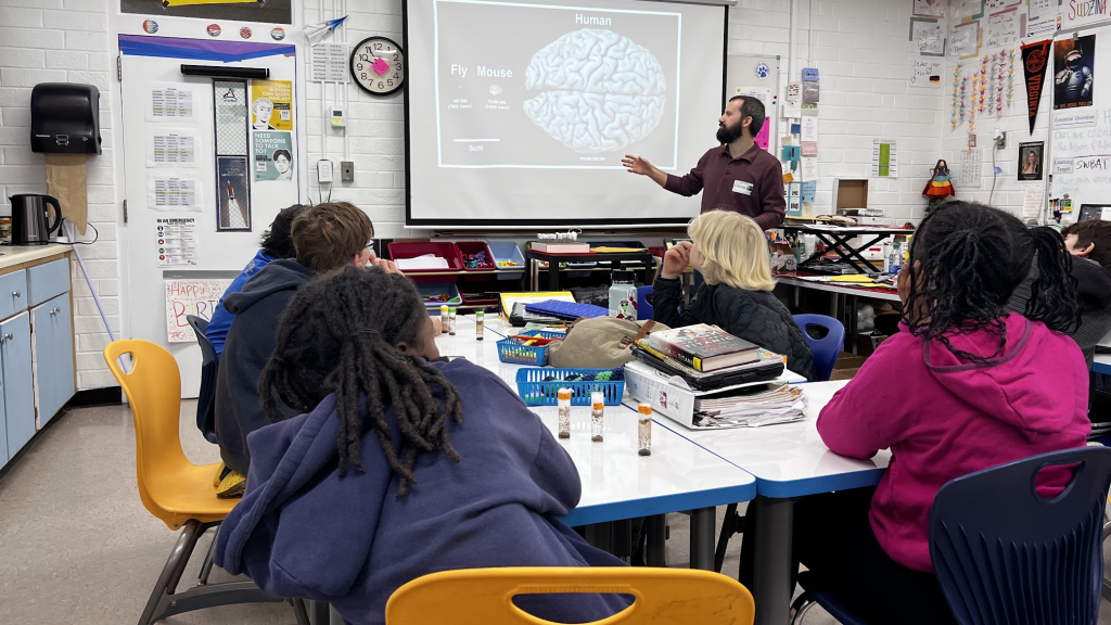 Christine Sudzina Schut’s UNC Chapel Hill mentor visits her classroom and presents his research to her students