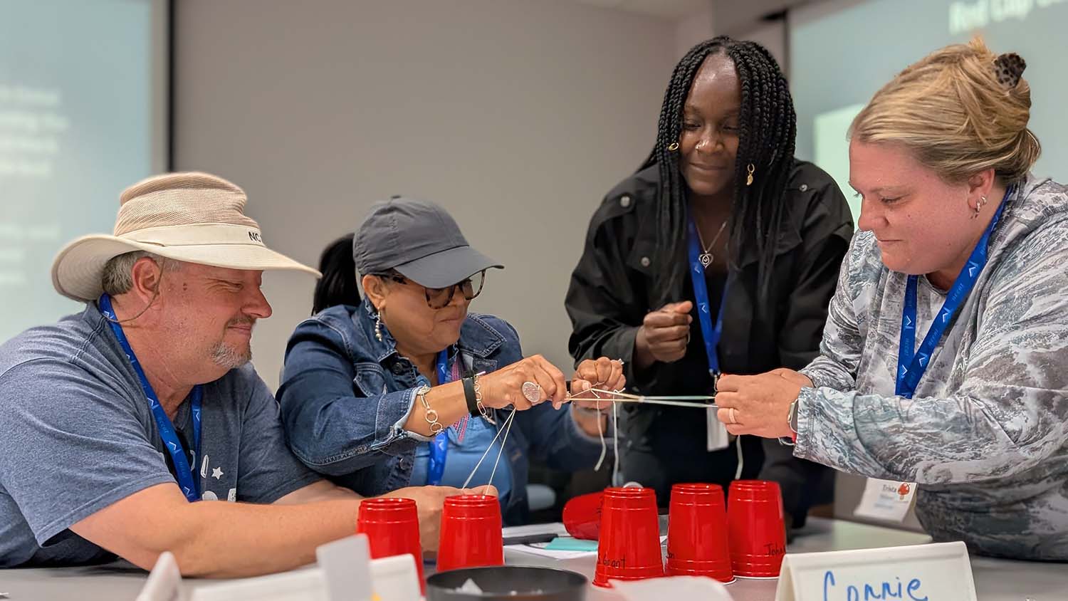 Teachers engage in a team building activity at the Summer Institute.