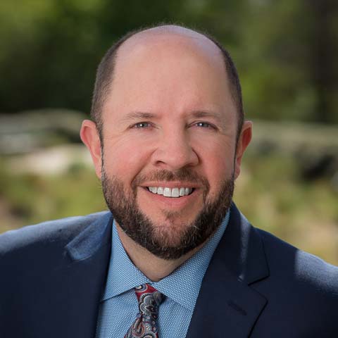 Outdoor headshot of Mark Townley