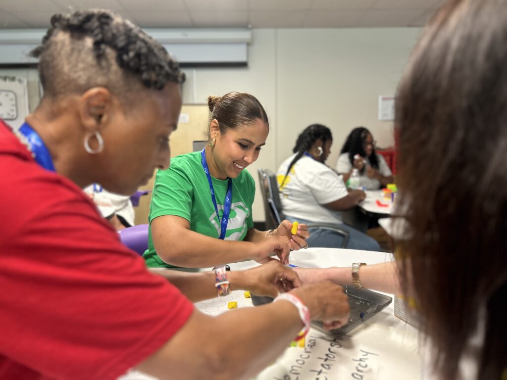 Kenan Fellows participate in a team building activity.